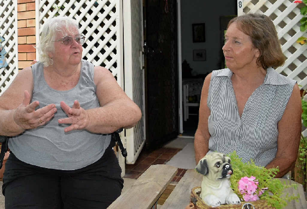 TIME FOR CHANGE: Neighbours Jane Royal and Cynthia Howe have been given 60 days to find somewhere else to live as Blue Care plan to close Cooinda Retirement Living. TIME FOR CHANGE: Neighbours Jane Royal and Cynthia Howe have been given 60 days to find somewhere else to live as Blue Care plan to close Cooinda Retirement Living.